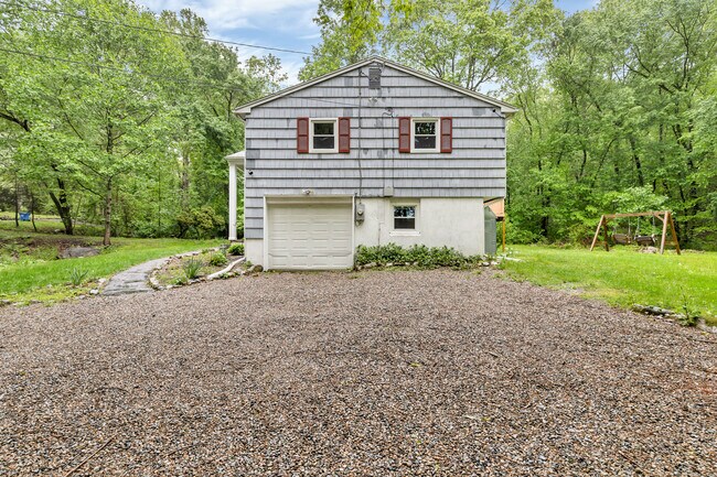 Building Photo - 21 Pheasant Run Dr