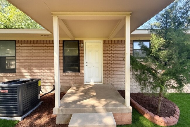 Photo - Cozy 3-Bedroom Brick Home with Covered Pat...