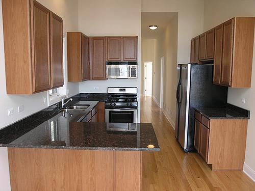 Building Photo - 3823 S Lowe Ave