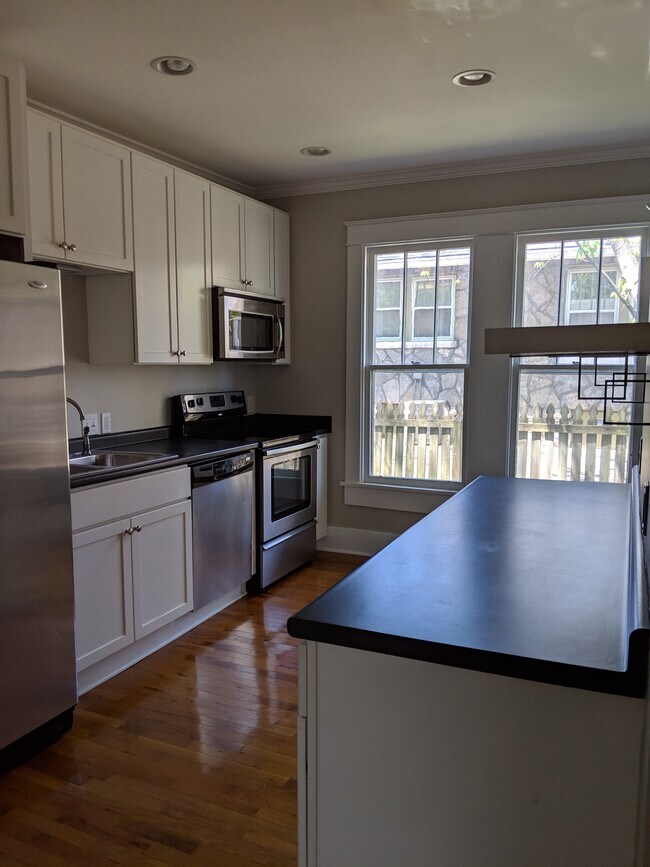Kitchen with dishwasher, oven & microwave - 2022 Benjamin St
