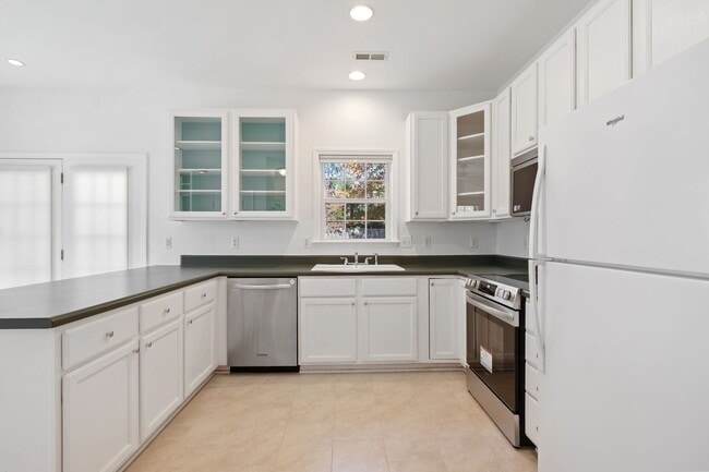 Building Photo - LOCATION!! Sought-after neighborhood spaci...