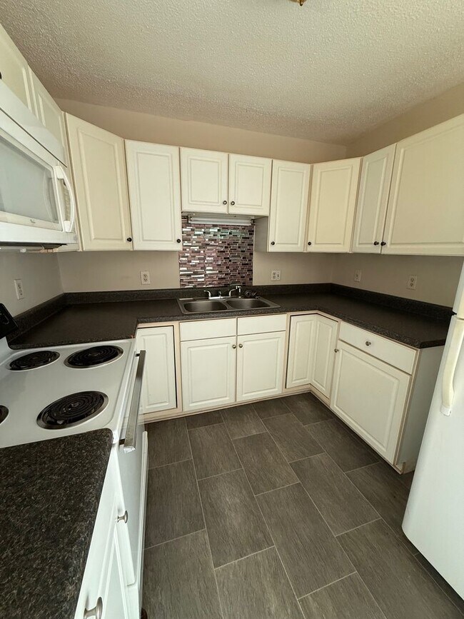 Building Photo - Serenity Village