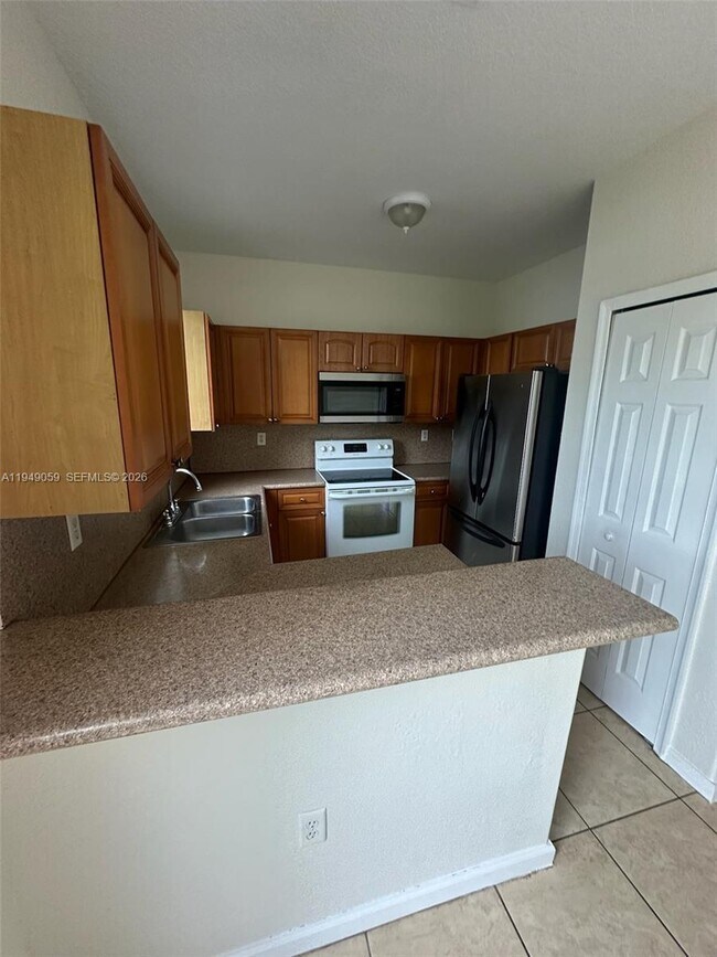 Foto del edificio - 1440 SE 24th Ct