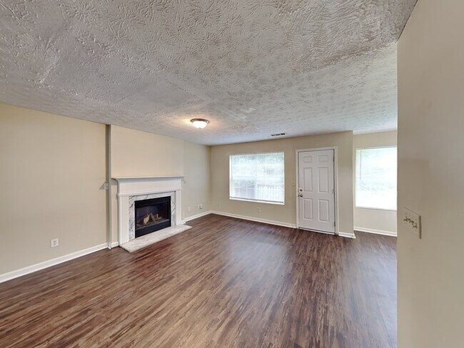 Building Photo - One Month Free! Charming 4 Bedroom Home lo...