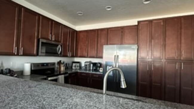 Building Photo - Upscale Townhome Haven: Designer Finishes ...