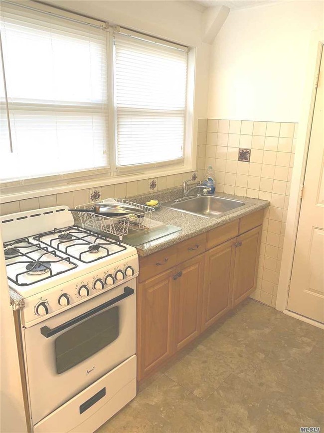 Building Photo - 218-24-218-39 39th Ave