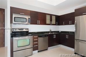 Building Photo - 1 br, 2 bath  - 3250 Grand Ave Ste 504