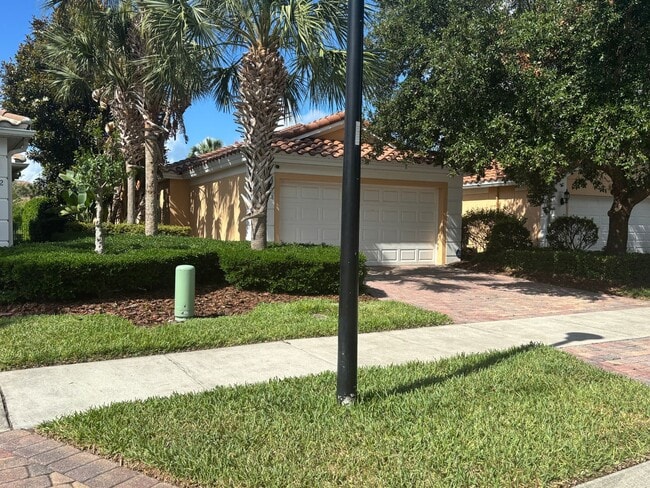 Photo - AGENT SHOWINGS ONLY! Gorgeous 2/2 + Den Mediterranean Villa with Waterfront Screened Patio and 2-... House