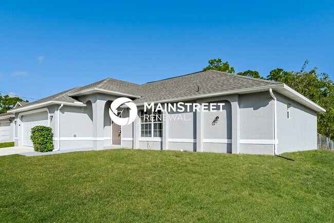 Foto del edificio - 3 Bedroom Pet-Friendly Home in Lehigh Acres, FL with Main Street Renewal
