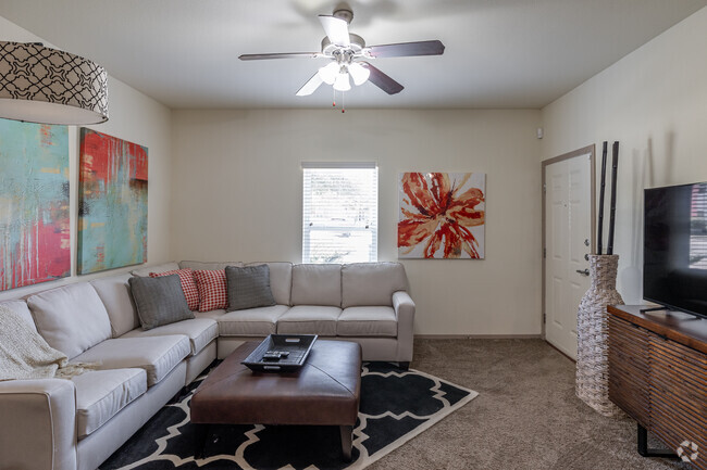 2BR, 1BA - 889SF - Living Room - The Greens at Fayetteville