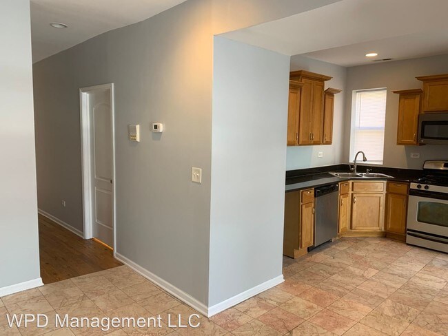 Building Photo - 7419 S Colfax Ave