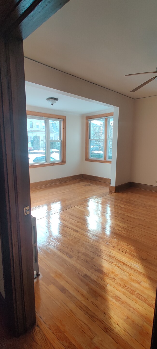 3. View from Foyer: Living Room - Sun Room - 1114 S Long Ave