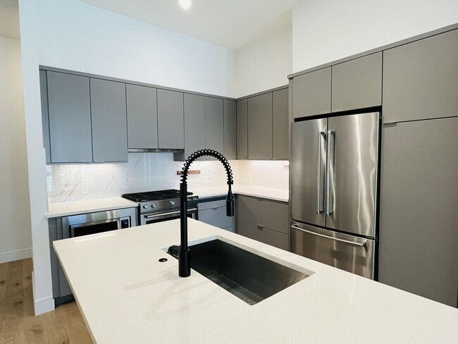 Building Photo - 3BD, 3.5BA West Wash Park Townhome with 2-Car Garage