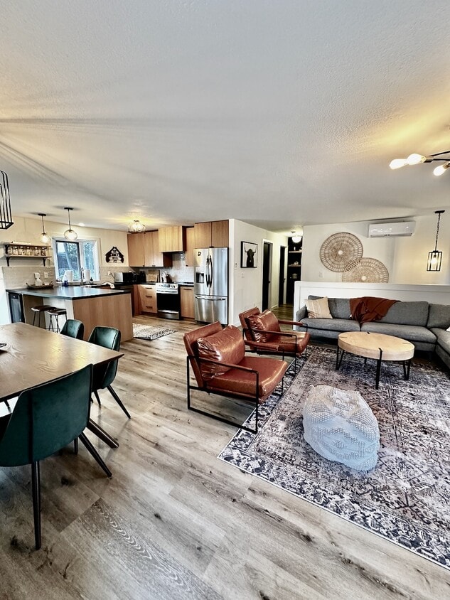 Main level living, kitchen, dining - 128 Mallard Loop