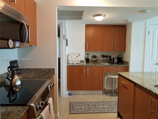 Building Photo - 10275 Collins Ave