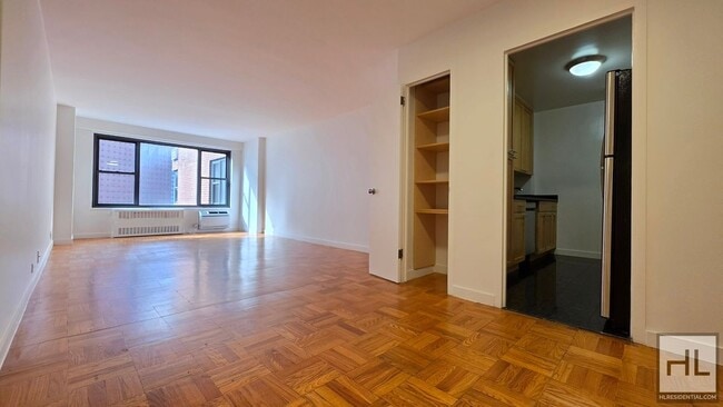 Building Photo - Sunlit 5th-Floor 1-Bed near Union Square | Doorman & Complimentary Gym