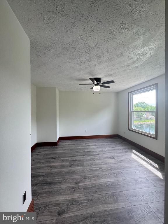 Building Photo - 8336 Claremont Woods Dr