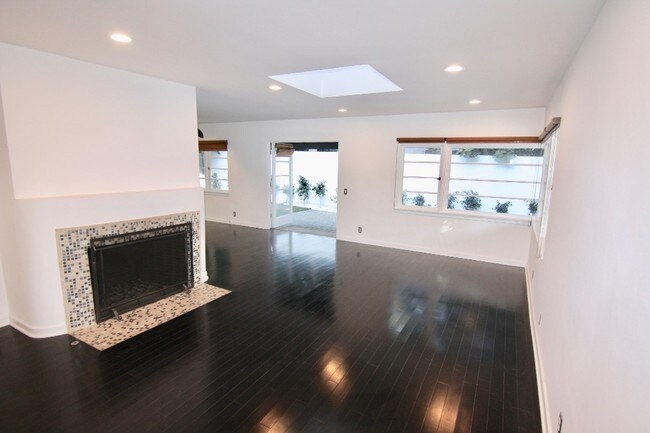 Gas and Wood Burning Fireplace - 8467 Willoughby Ave