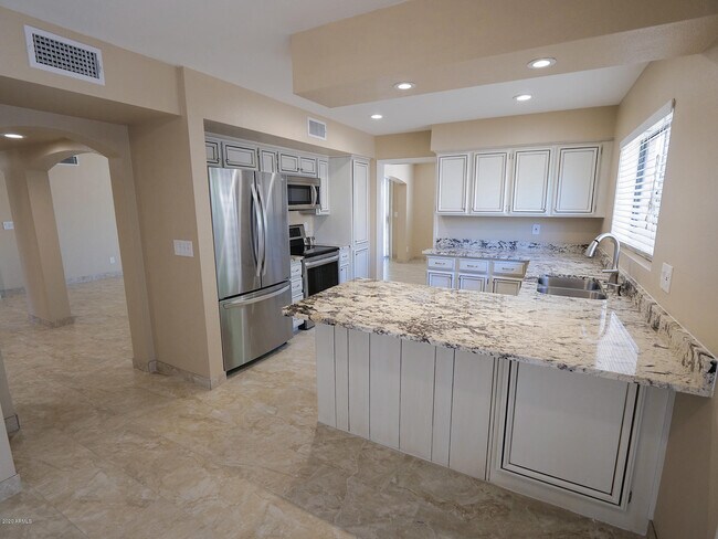 Foto del edificio - 6721 E Phelps Rd