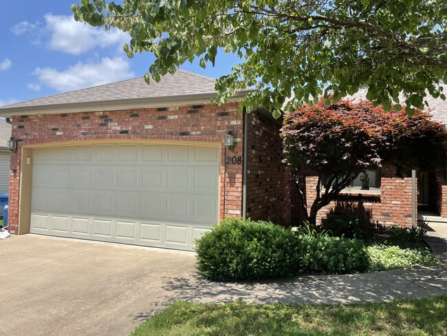 2 car attached with front entry door - 208 W Briarbrook Ln