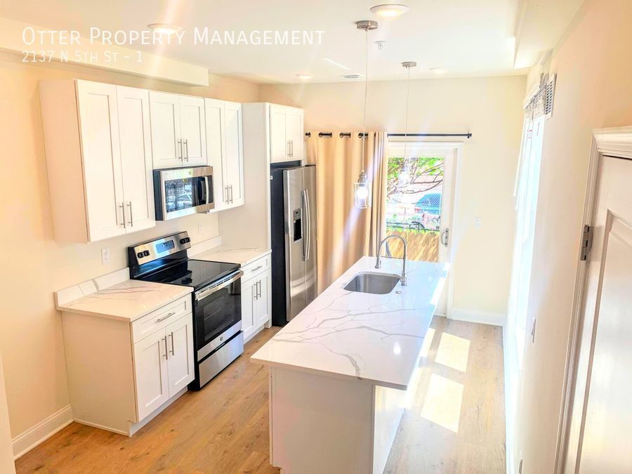 Foto principal - Stunning 2BR/1.5BA Temple Area Gem with Ba...