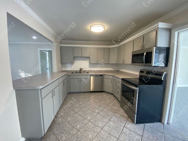 Building Photo - 7301 N Dartmouth Ave