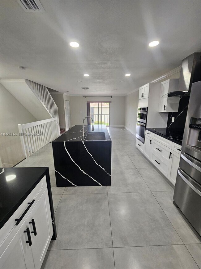 Foto del edificio - 9846 Hammocks Blvd