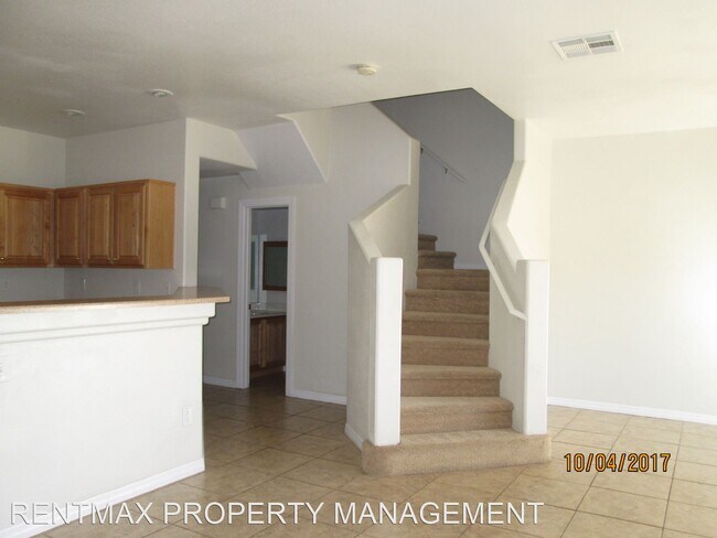 Building Photo - 3 br, 2 bath House - 9107 BUSHY TAIL AVE #102