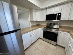 Building Photo - 12250 Tamiami Trl E
