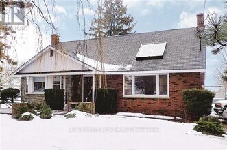 Building Photo - 7265 Baldwin St N