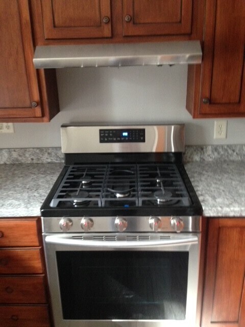 gas range - 216 E Vermilya Ave