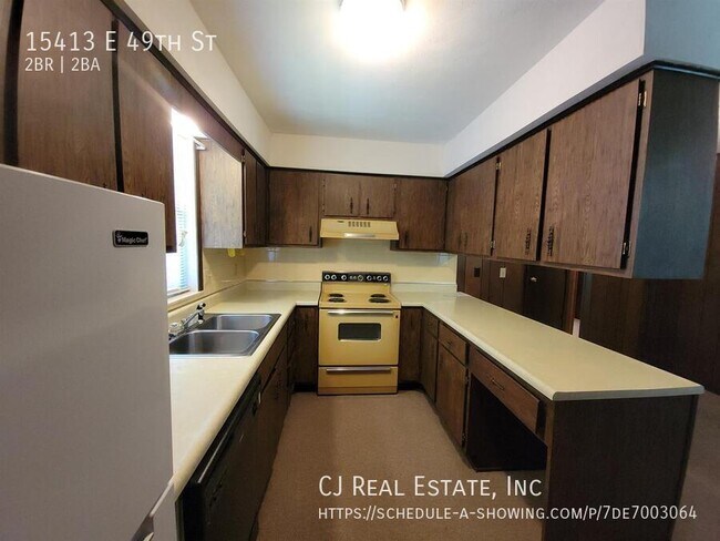 Foto del edificio - 15413 E 49th St