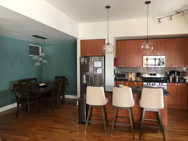 Kitchen plus dining area - 1601 S State St