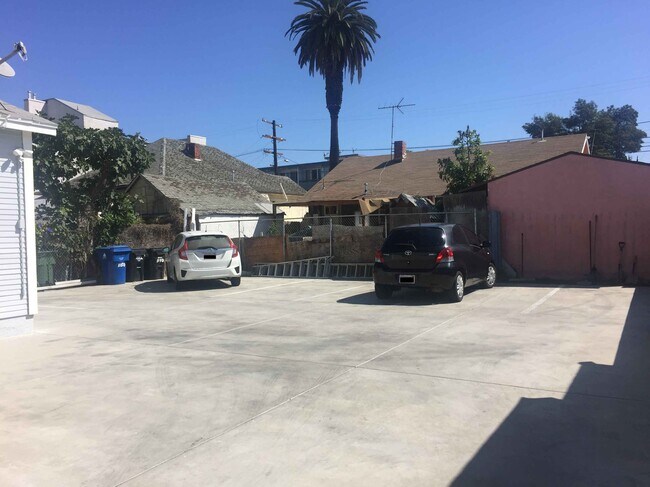 space for 2 cars behind the building! - 1150 N Ardmore Ave