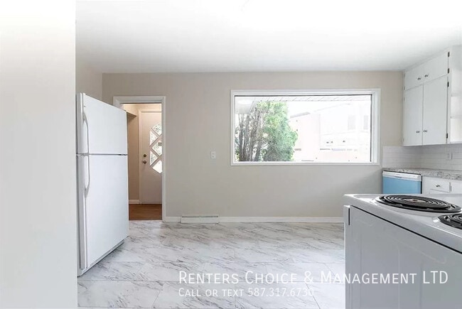 Building Photo - Dog Friendly Main Floor Across From Medici...