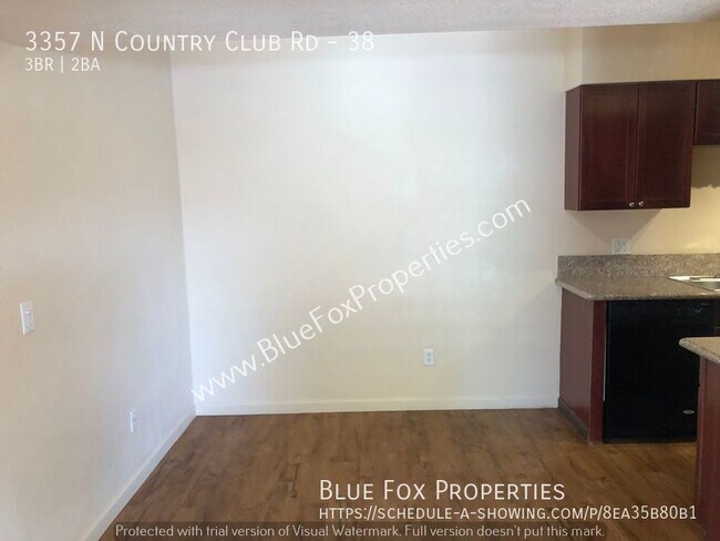 Building Photo - 3357 N Country Club #38