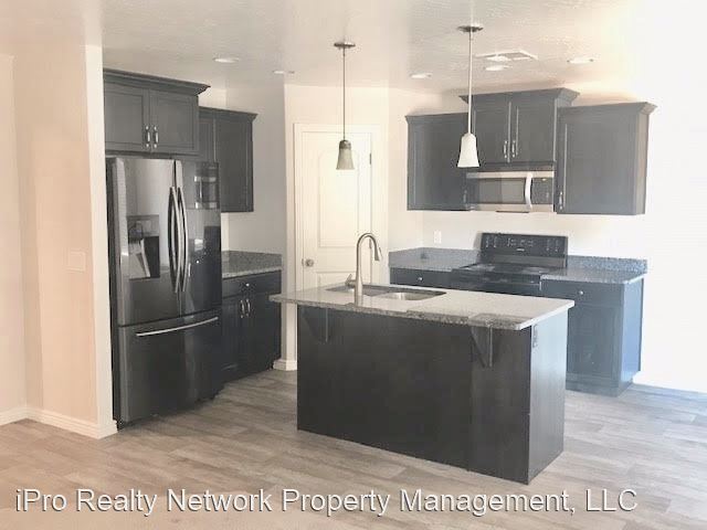 Foto del edificio - 3 br, 2 bath House - 5985 S. Rimrunner Drive