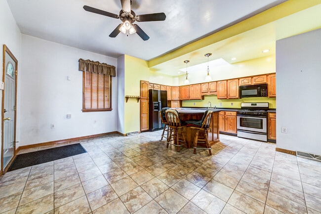 Building Photo - AVAILABLE AUGUST - Beautifully Brick Home ...