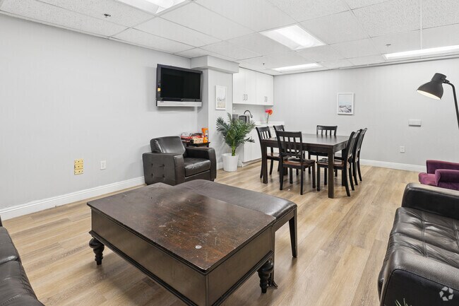 Sala de actividades - Commodore Regency Apartments