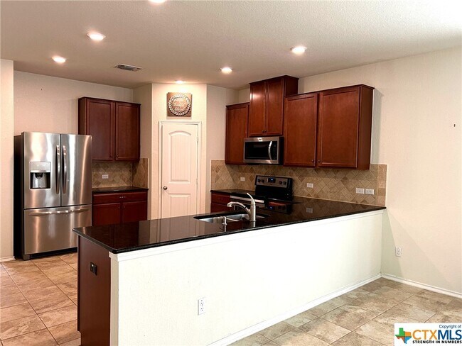 Foto del edificio - 9030 Lonesome Oak Drive