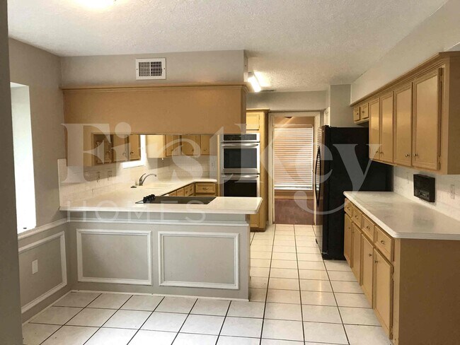 Foto del edificio - 12906 Elmington Ct