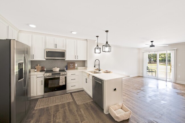 Cocina y comedor Azalea - Village Green Apartment Homes