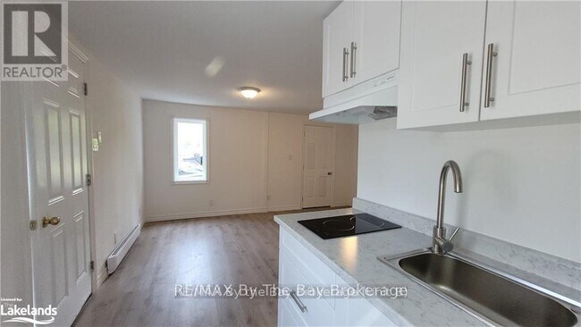 Photo du bâtiment - 280-280 River Rd E