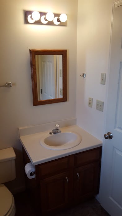 Vanity & mirror - 216 W Pierce St