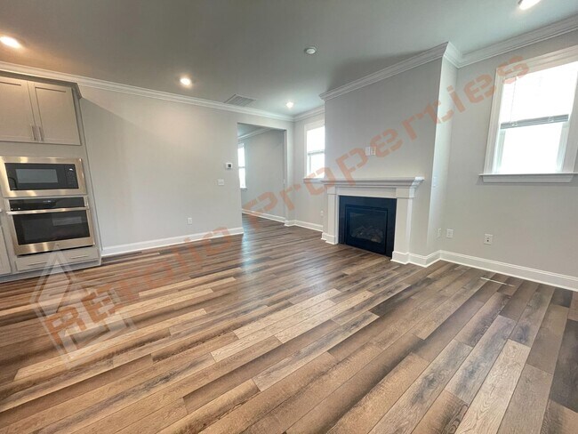 Building Photo - Beautiful 4 Bedroom 2.5 Bath Home with 2 Car Rear Entry Garage, First Floor Primary Bedroom Suite...