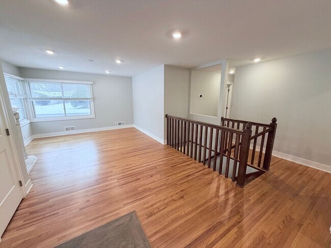 Building Photo - Spacious 4-Bedroom Home with Pond Views & EV-Ready Garage – Bloomington!!