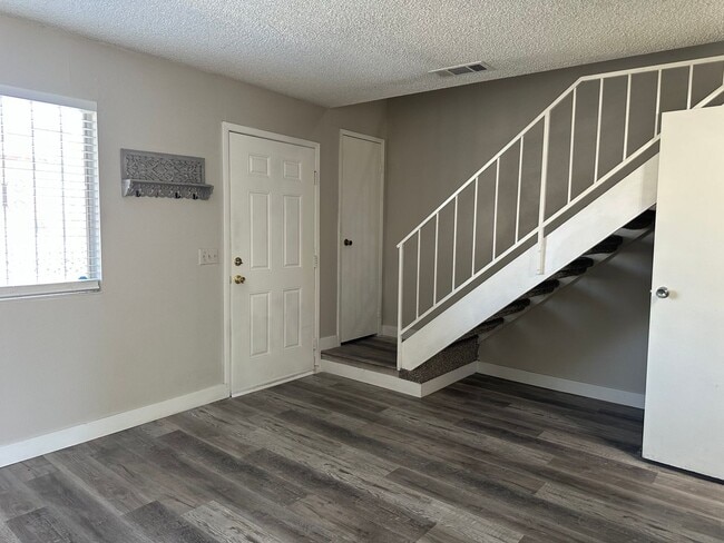 Building Photo - Three bedroom townhome with 2 car garage a...