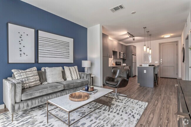 1BR, 1BA - 702 SF A2 - Living Area - Lux on Main