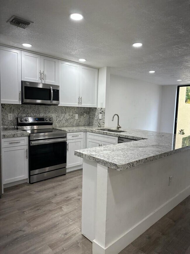 Building Photo - 9906 Costa Del Sol Blvd