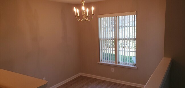Building Photo - Enjoy virtually maintenance free living in...